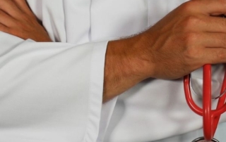 doctor holding stethoscope